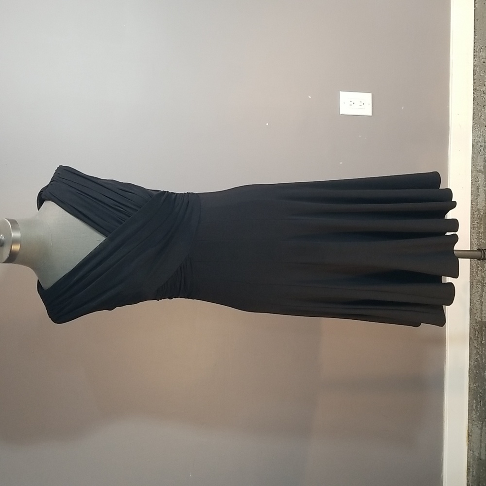 Frank Lyman size 6 black dress made in Canada stretchy fabric.  Designer quality